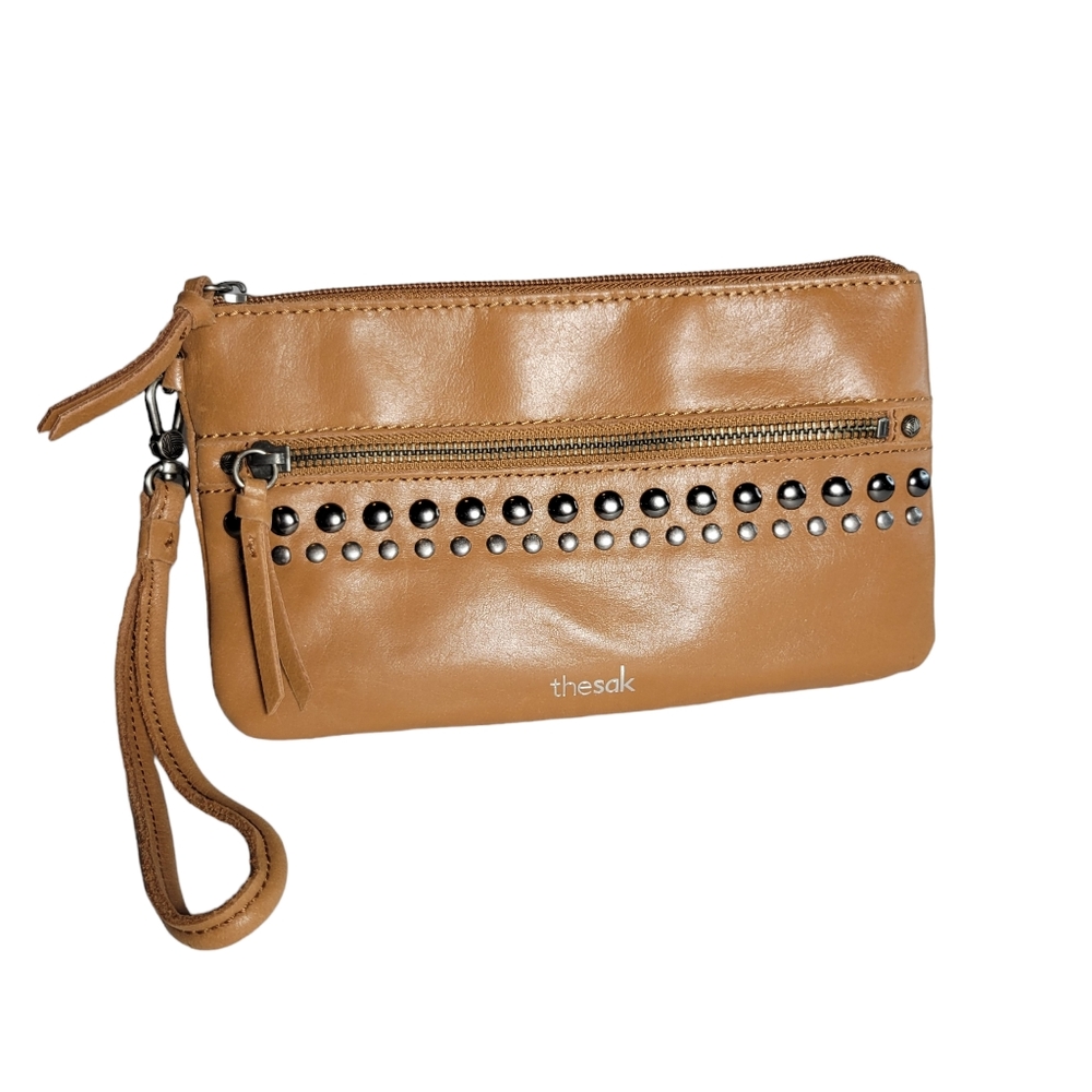 The Sak tan studded zip wristlet clutch bag
